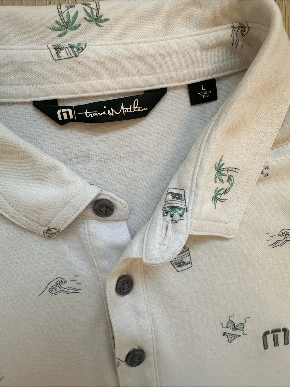 Travis Mathew White Polo with Palm & Beach Icons